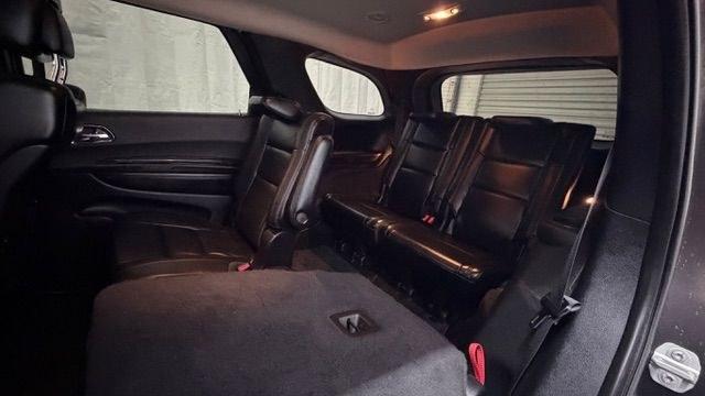 2015 Gray Dodge Durango Limited 2WD (1C4RDHDG7FC) with an 3.6L V6 DOHC 24V engine, 8-Speed Automatic transmission, located at 1806 Veterans Memorial Hwy SW, Austell, GA, 30168, (770) 944-9558, 33.817959, -84.606987 - This Dodge Durango has passed a 100+ point inspection performed in our own service center. It's in great condition and runs awesome. The interior is really clean. The rear tires are new and the front tires are in good condition. The only blemish to note is a large dent on the rear quarter panel. Com- Photo#16