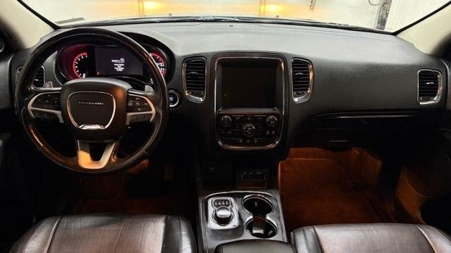 2015 Gray Dodge Durango Limited 2WD (1C4RDHDG7FC) with an 3.6L V6 DOHC 24V engine, 8-Speed Automatic transmission, located at 1806 Veterans Memorial Hwy SW, Austell, GA, 30168, (770) 944-9558, 33.817959, -84.606987 - This Dodge Durango has passed a 100+ point inspection performed in our own service center. It's in great condition and runs awesome. The interior is really clean. The rear tires are new and the front tires are in good condition. The only blemish to note is a large dent on the rear quarter panel. Com- Photo#17