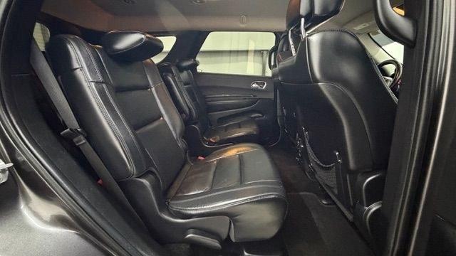 2015 Gray Dodge Durango Limited 2WD (1C4RDHDG7FC) with an 3.6L V6 DOHC 24V engine, 8-Speed Automatic transmission, located at 1806 Veterans Memorial Hwy SW, Austell, GA, 30168, (770) 944-9558, 33.817959, -84.606987 - This Dodge Durango has passed a 100+ point inspection performed in our own service center. It's in great condition and runs awesome. The interior is really clean. The rear tires are new and the front tires are in good condition. The only blemish to note is a large dent on the rear quarter panel. Com- Photo#18