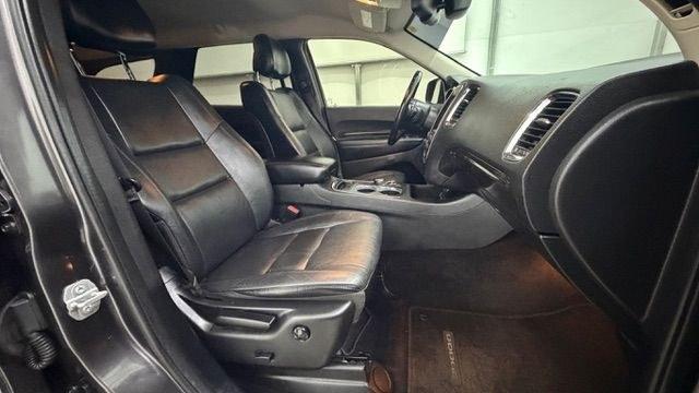 2015 Gray Dodge Durango Limited 2WD (1C4RDHDG7FC) with an 3.6L V6 DOHC 24V engine, 8-Speed Automatic transmission, located at 1806 Veterans Memorial Hwy SW, Austell, GA, 30168, (770) 944-9558, 33.817959, -84.606987 - This Dodge Durango has passed a 100+ point inspection performed in our own service center. It's in great condition and runs awesome. The interior is really clean. The rear tires are new and the front tires are in good condition. The only blemish to note is a large dent on the rear quarter panel. Com- Photo#19