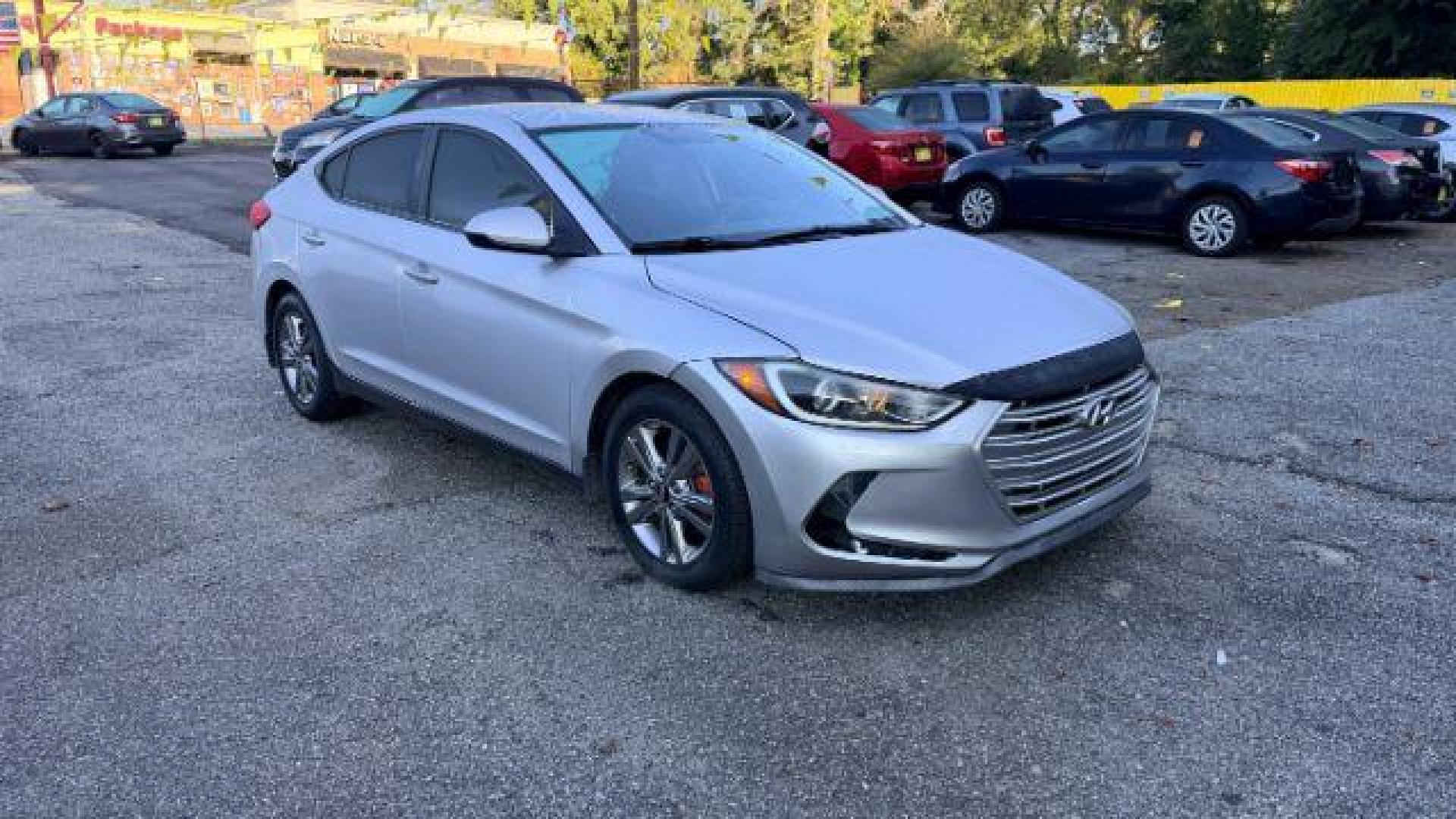 2018 Silver Hyundai Elantra SE (KMHD84LF9JU) with an 2.0L I-4 MPI DOHC engine, Automatic transmission, located at 1806 Veterans Memorial Hwy SW, Austell, GA, 30168, (770) 944-9558, 33.817959, -84.606987 - Photo#2