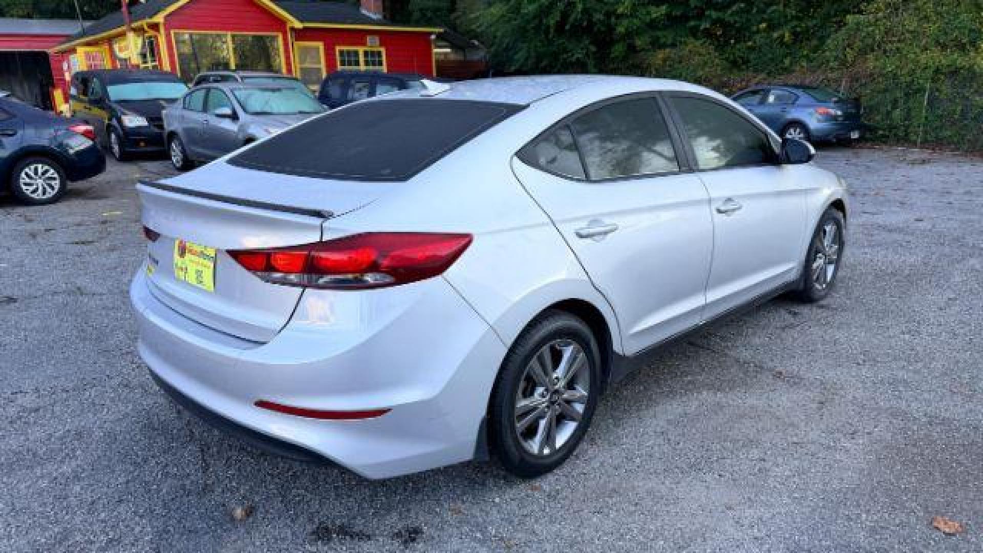 2018 Silver Hyundai Elantra SE (KMHD84LF9JU) with an 2.0L I-4 MPI DOHC engine, Automatic transmission, located at 1806 Veterans Memorial Hwy SW, Austell, GA, 30168, (770) 944-9558, 33.817959, -84.606987 - Photo#3