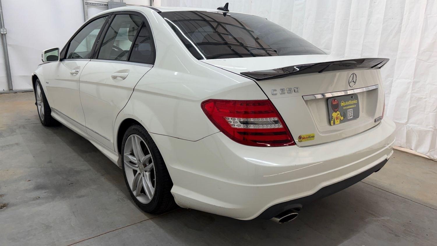 2012 White Mercedes Benz C Class C250 (WDDGF4HB1CR) with an 1.8L I-4 DI T/C I/C engine, located at 1806 Veterans Memorial Hwy SW, Austell, GA, 30168, (770) 944-9558, 33.817959, -84.606987 - Save money while riding with class in this Mercedes. The overall paint is good, with a couple of paint scrapes on the passenger door. The tires are in good condition, and the interior is in good shape; this is a non-smoking vehicle.- Photo#3