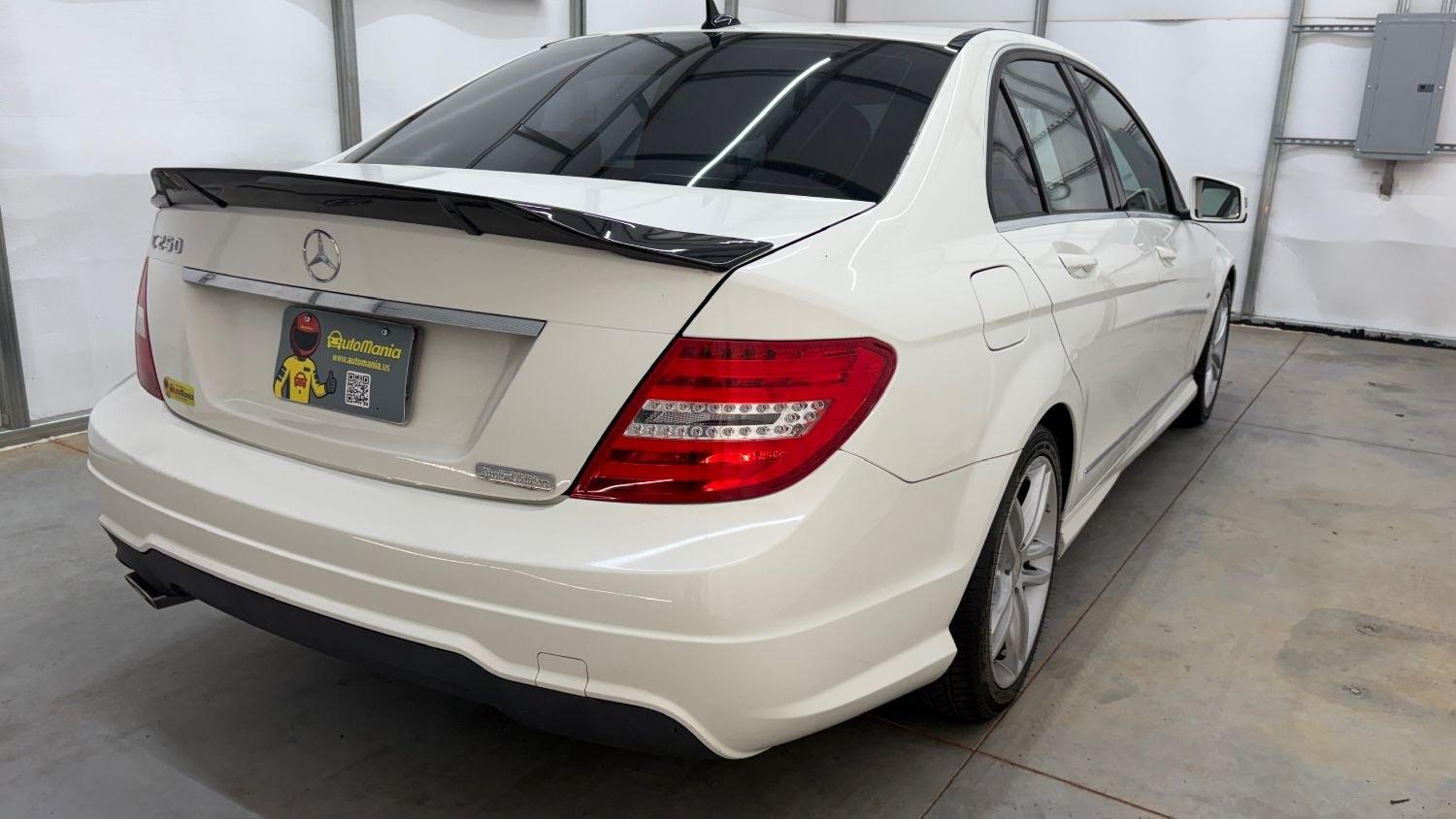 2012 White Mercedes Benz C Class C250 (WDDGF4HB1CR) with an 1.8L I-4 DI T/C I/C engine, located at 1806 Veterans Memorial Hwy SW, Austell, GA, 30168, (770) 944-9558, 33.817959, -84.606987 - Save money while riding with class in this Mercedes. The overall paint is good, with a couple of paint scrapes on the passenger door. The tires are in good condition, and the interior is in good shape; this is a non-smoking vehicle.- Photo#5