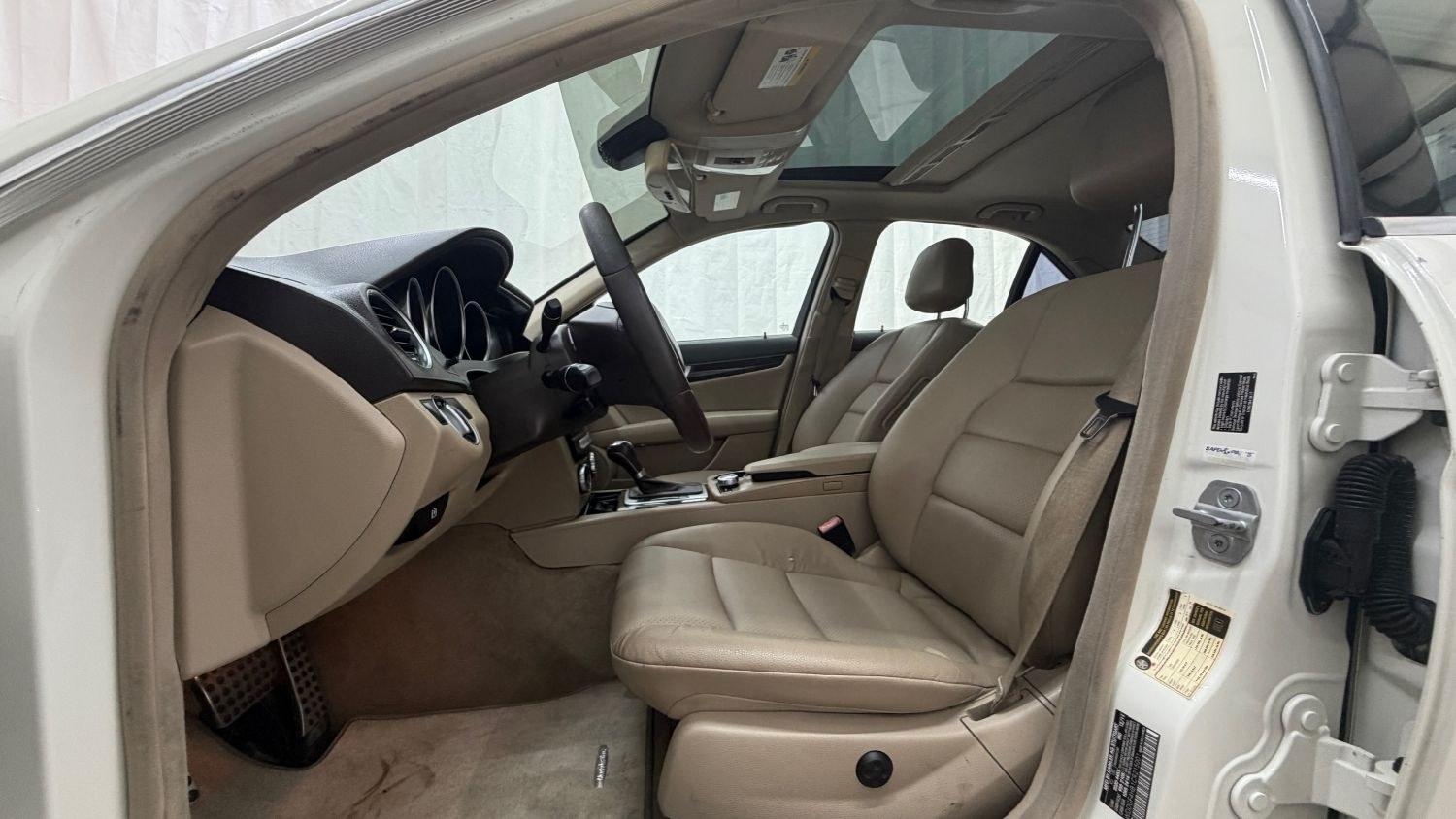 2012 White Mercedes Benz C Class C250 (WDDGF4HB1CR) with an 1.8L I-4 DI T/C I/C engine, located at 1806 Veterans Memorial Hwy SW, Austell, GA, 30168, (770) 944-9558, 33.817959, -84.606987 - Save money while riding with class in this Mercedes. The overall paint is good, with a couple of paint scrapes on the passenger door. The tires are in good condition, and the interior is in good shape; this is a non-smoking vehicle.- Photo#12