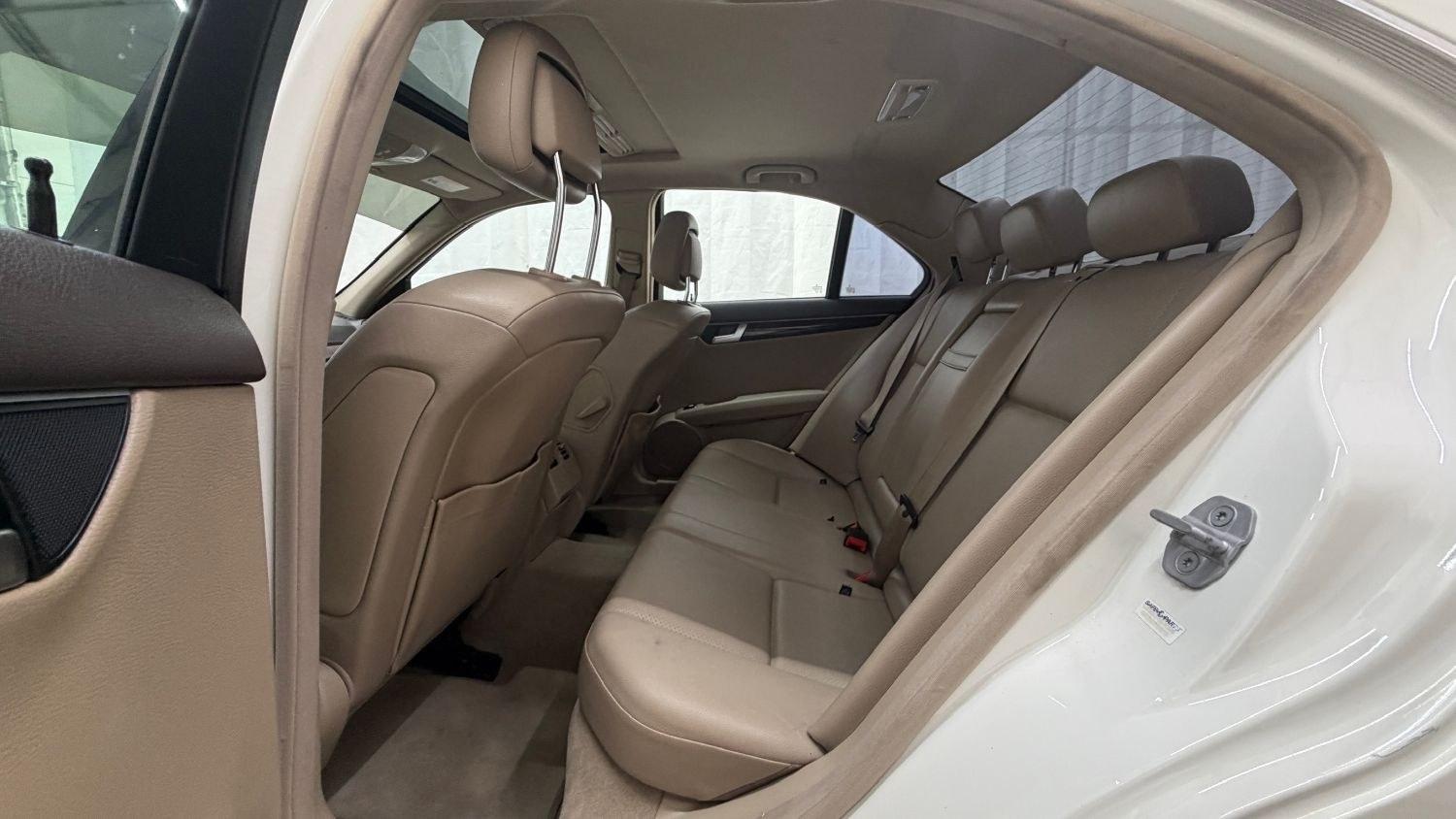 2012 White Mercedes Benz C Class C250 (WDDGF4HB1CR) with an 1.8L I-4 DI T/C I/C engine, located at 1806 Veterans Memorial Hwy SW, Austell, GA, 30168, (770) 944-9558, 33.817959, -84.606987 - Save money while riding with class in this Mercedes. The overall paint is good, with a couple of paint scrapes on the passenger door. The tires are in good condition, and the interior is in good shape; this is a non-smoking vehicle.- Photo#14