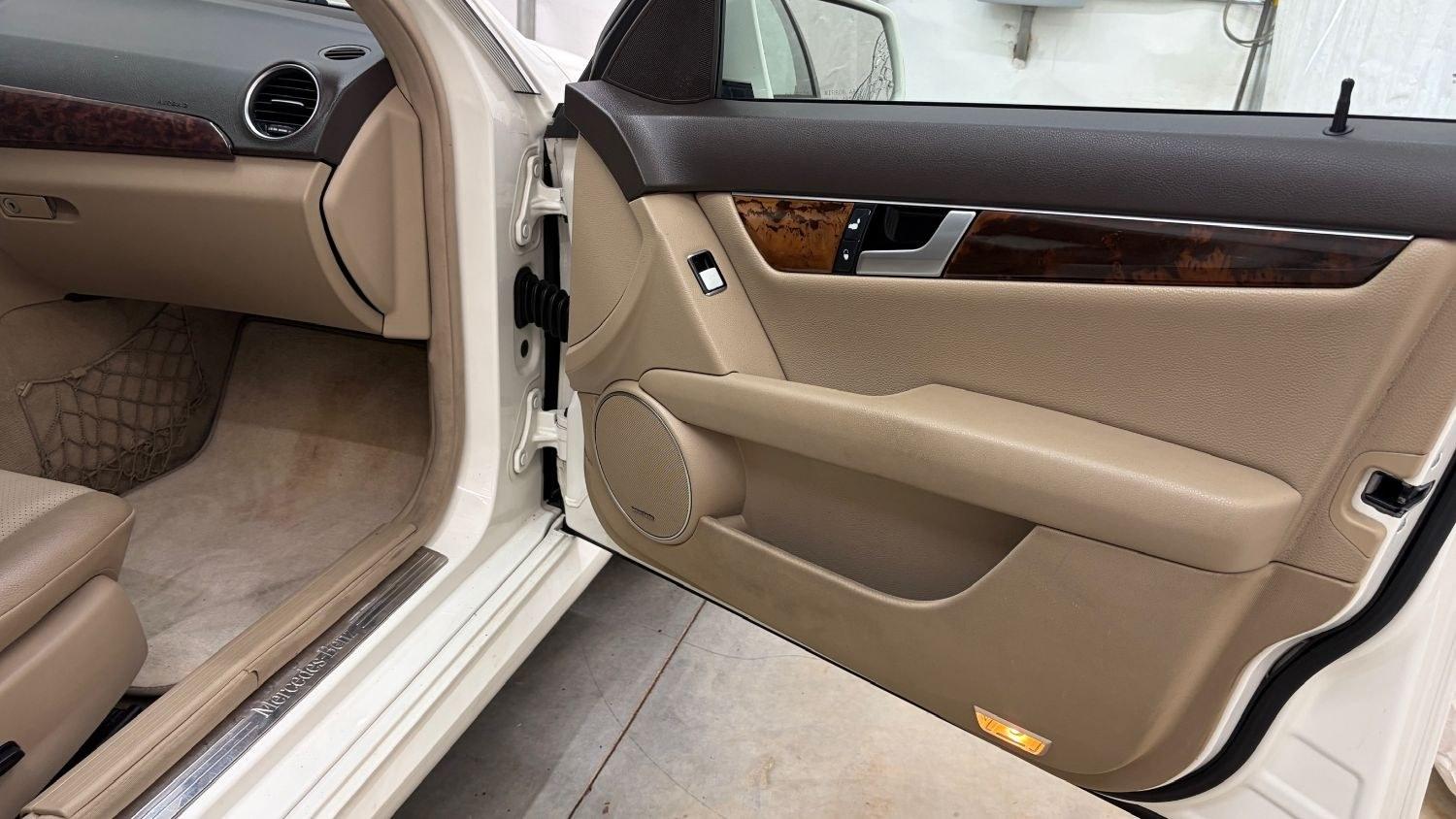 2012 White Mercedes Benz C Class C250 (WDDGF4HB1CR) with an 1.8L I-4 DI T/C I/C engine, located at 1806 Veterans Memorial Hwy SW, Austell, GA, 30168, (770) 944-9558, 33.817959, -84.606987 - Save money while riding with class in this Mercedes. The overall paint is good, with a couple of paint scrapes on the passenger door. The tires are in good condition, and the interior is in good shape; this is a non-smoking vehicle.- Photo#18