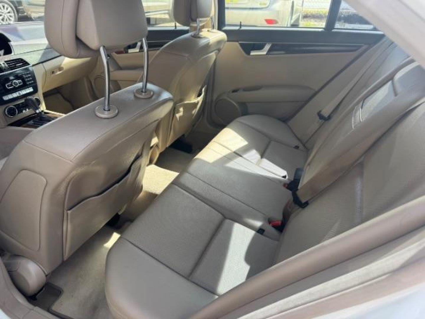 2012 White Mercedes Benz C Class C250 (WDDGF4HB1CR) with an 1.8L I-4 DI T/C I/C engine, located at 1806 Veterans Memorial Hwy SW, Austell, GA, 30168, (770) 944-9558, 33.817959, -84.606987 - Photo#9
