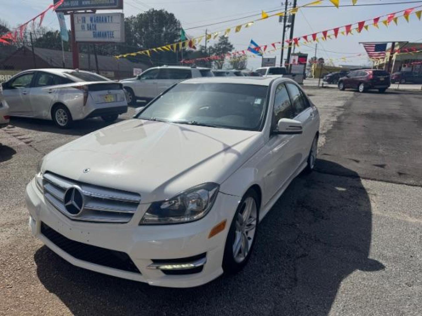 2012 White Mercedes Benz C Class C250 (WDDGF4HB1CR) with an 1.8L I-4 DI T/C I/C engine, located at 1806 Veterans Memorial Hwy SW, Austell, GA, 30168, (770) 944-9558, 33.817959, -84.606987 - Photo#0