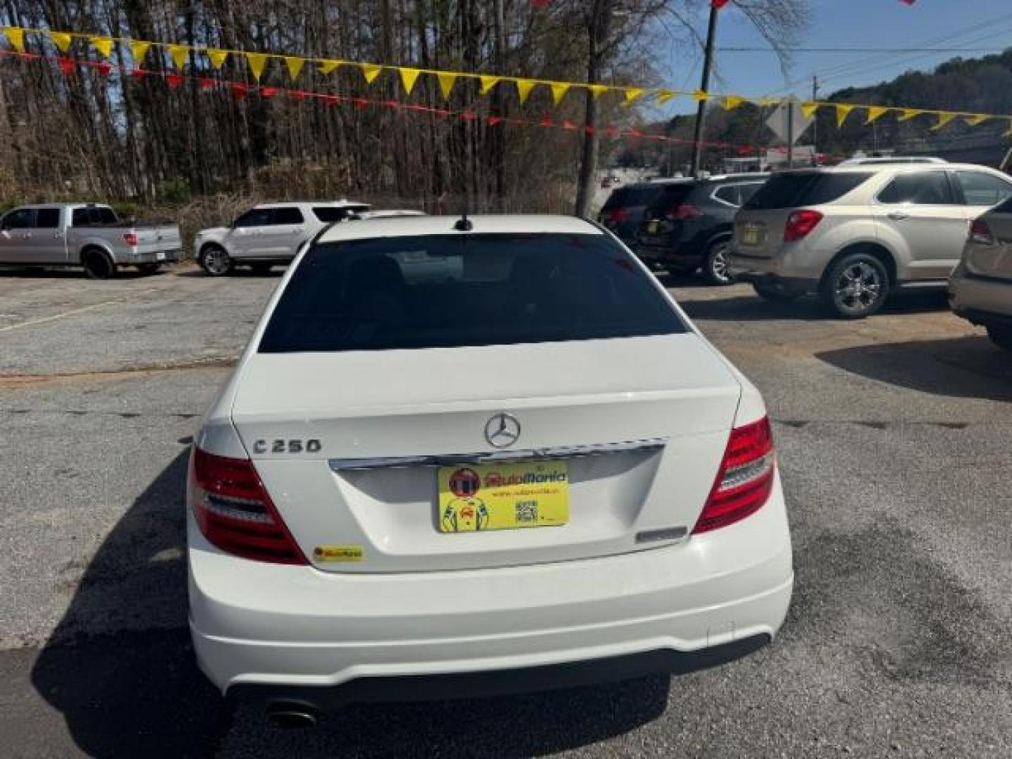 2012 White Mercedes Benz C Class C250 (WDDGF4HB1CR) with an 1.8L I-4 DI T/C I/C engine, located at 1806 Veterans Memorial Hwy SW, Austell, GA, 30168, (770) 944-9558, 33.817959, -84.606987 - Photo#4
