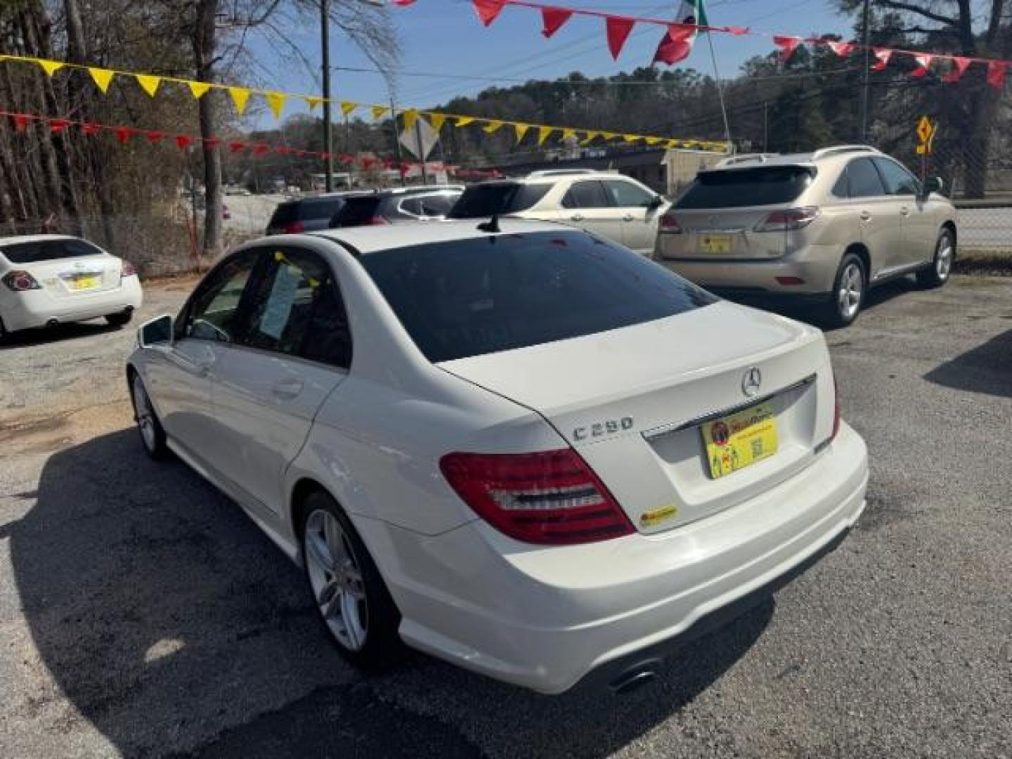 2012 White Mercedes Benz C Class C250 (WDDGF4HB1CR) with an 1.8L I-4 DI T/C I/C engine, located at 1806 Veterans Memorial Hwy SW, Austell, GA, 30168, (770) 944-9558, 33.817959, -84.606987 - Photo#5