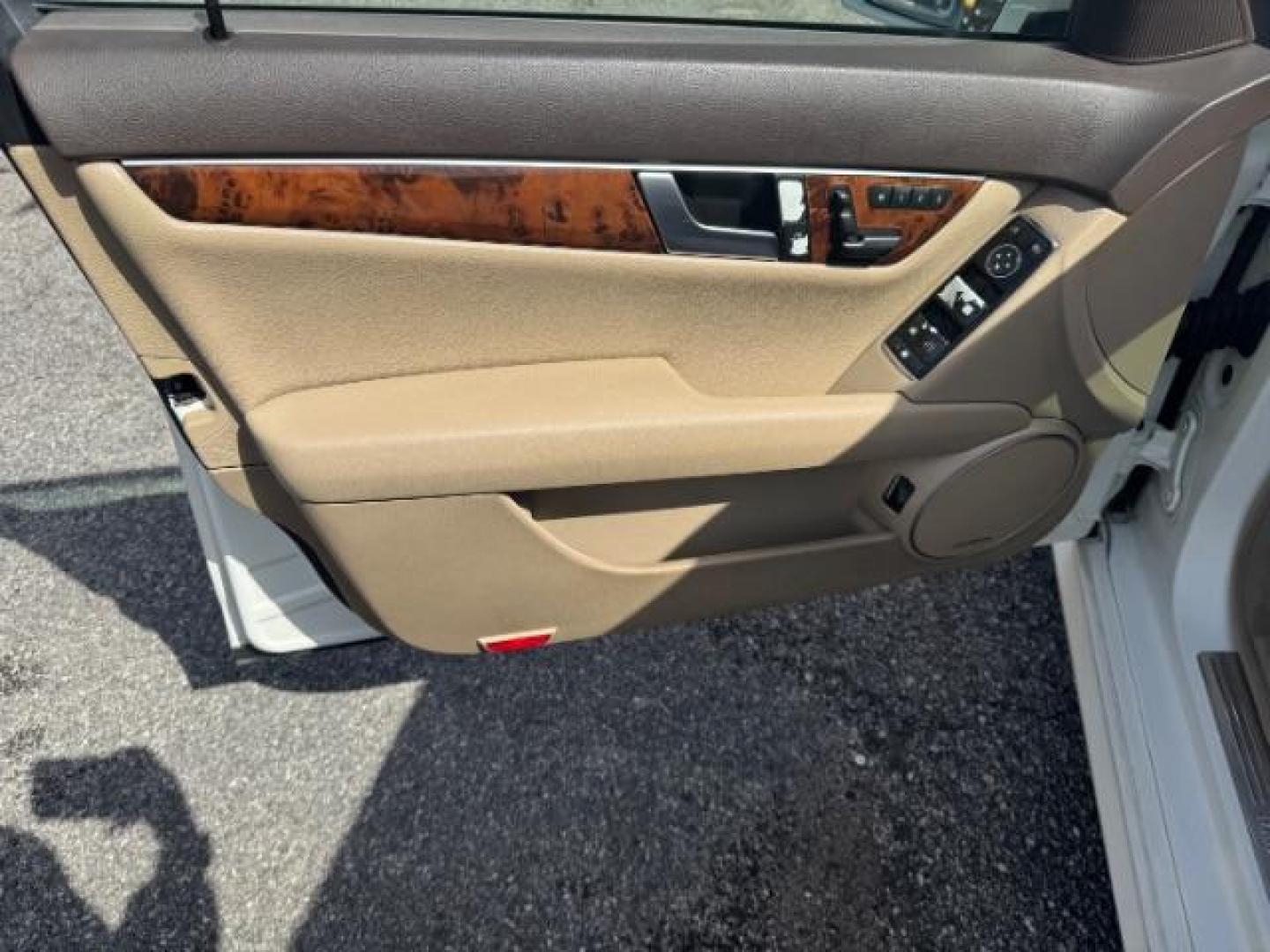 2012 White Mercedes Benz C Class C250 (WDDGF4HB1CR) with an 1.8L I-4 DI T/C I/C engine, located at 1806 Veterans Memorial Hwy SW, Austell, GA, 30168, (770) 944-9558, 33.817959, -84.606987 - Photo#7