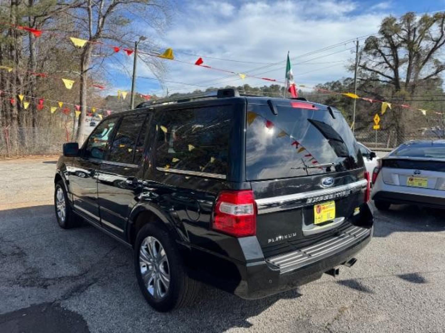 2015 Black Ford Expedition Platinum 2WD (1FMJU1LT3FE) with an 3.5L V6 DOHC 24V FFV engine, 6-Speed Automatic transmission, located at 1806 Veterans Memorial Hwy SW, Austell, GA, 30168, (770) 944-9558, 33.817959, -84.606987 - Photo#4