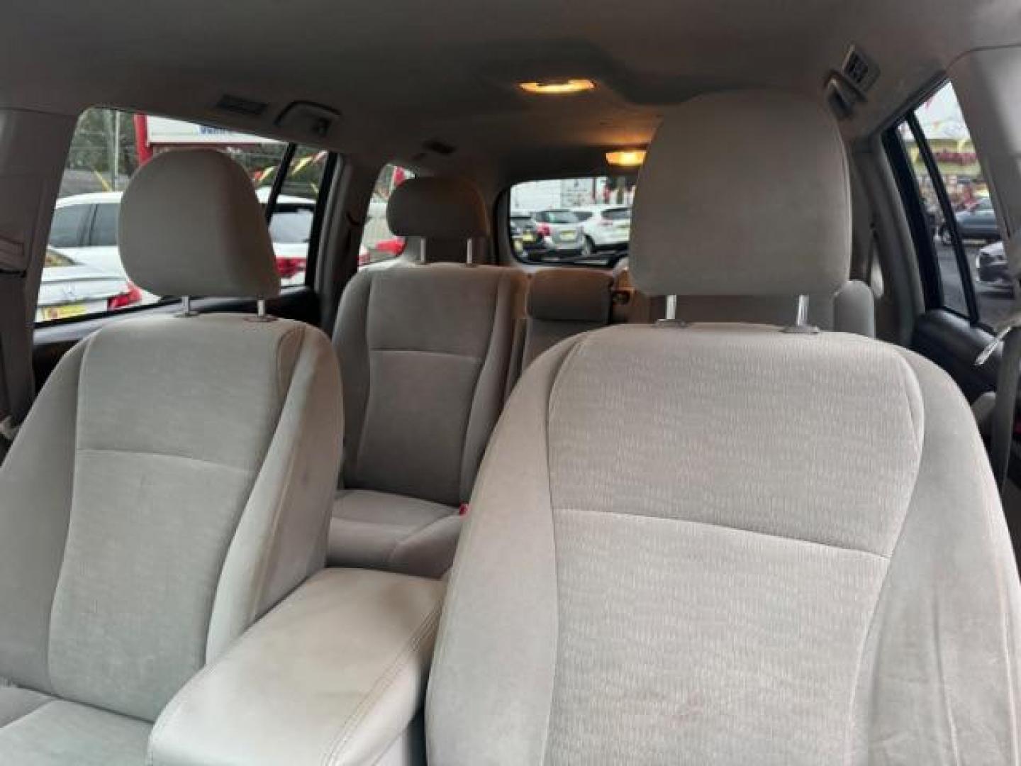 2012 White Toyota Highlander Base 2WD V6 (5TDZK3EH8CS) with an 3.5L V6 DOHC 24V engine, 5-Speed Automatic transmission, located at 1806 Veterans Memorial Hwy SW, Austell, GA, 30168, (770) 944-9558, 33.817959, -84.606987 - Photo#8