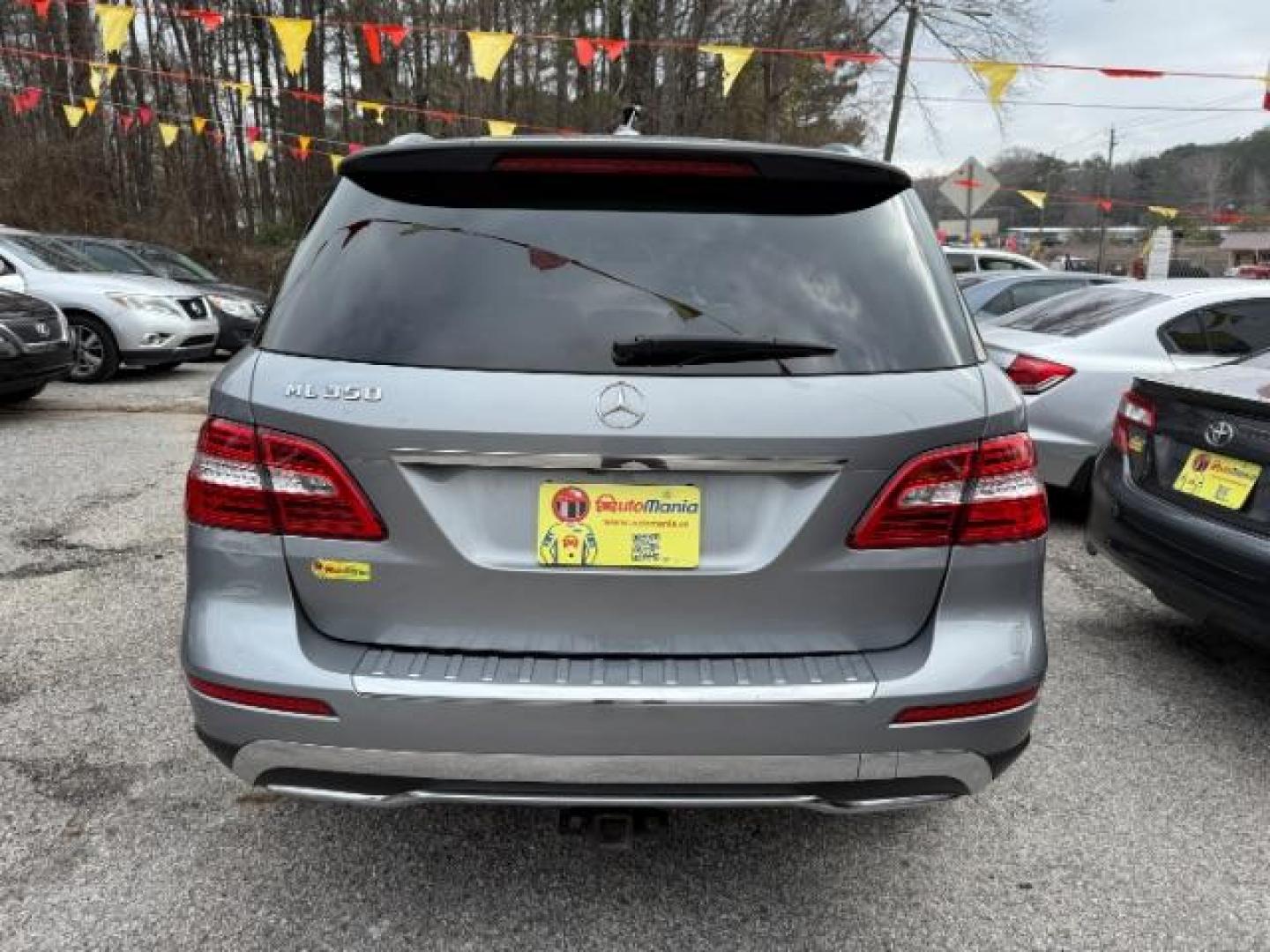 2015 Silver Mercedes-Benz M-Class ML350 (4JGDA5JB6FA) with an 3.5L V6 DOHC 24V engine, 7-Speed Automatic transmission, located at 1806 Veterans Memorial Hwy SW, Austell, GA, 30168, (770) 944-9558, 33.817959, -84.606987 - Photo#9