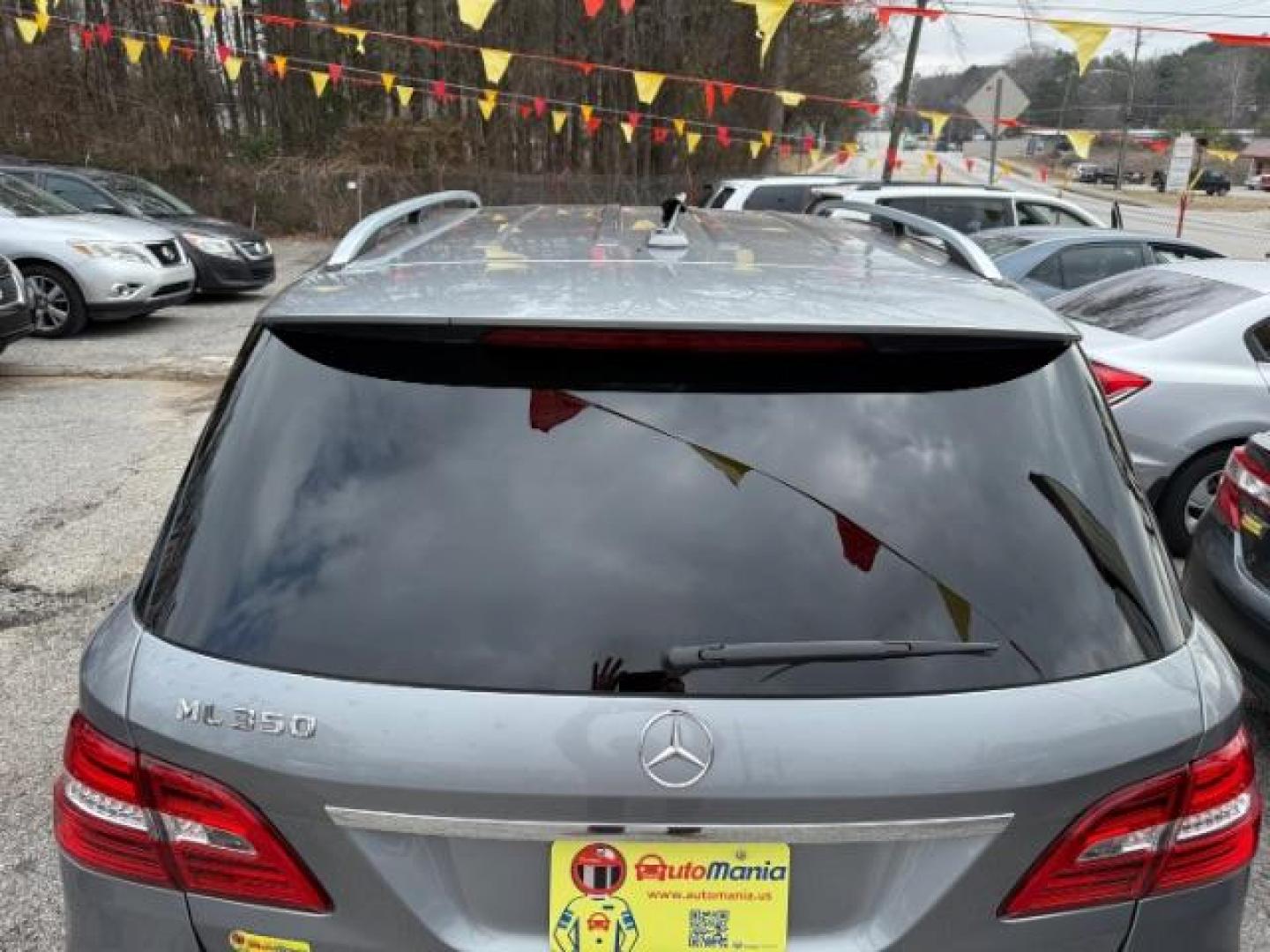 2015 Silver Mercedes-Benz M-Class ML350 (4JGDA5JB6FA) with an 3.5L V6 DOHC 24V engine, 7-Speed Automatic transmission, located at 1806 Veterans Memorial Hwy SW, Austell, GA, 30168, (770) 944-9558, 33.817959, -84.606987 - Photo#10