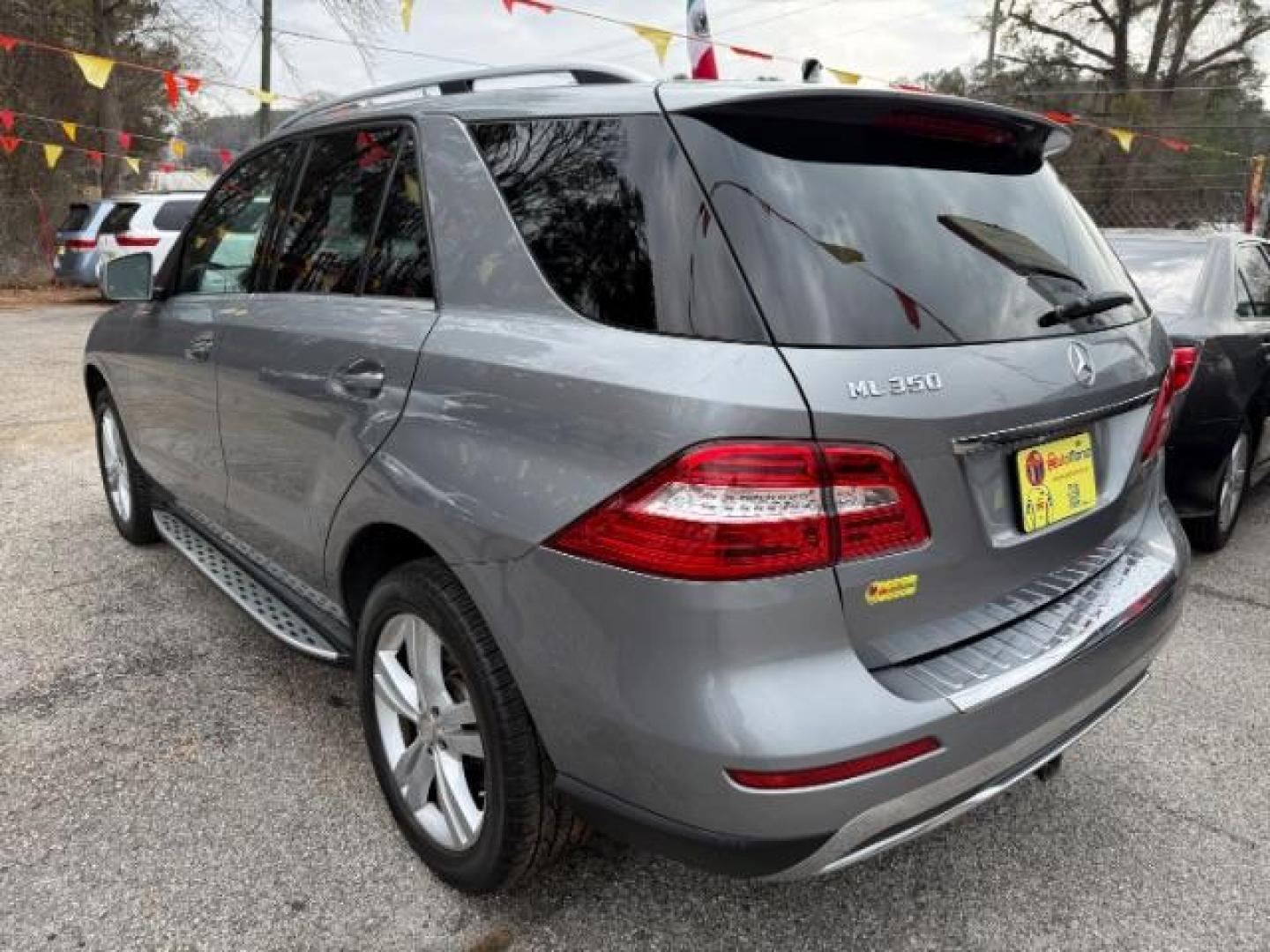 2015 Silver Mercedes-Benz M-Class ML350 (4JGDA5JB6FA) with an 3.5L V6 DOHC 24V engine, 7-Speed Automatic transmission, located at 1806 Veterans Memorial Hwy SW, Austell, GA, 30168, (770) 944-9558, 33.817959, -84.606987 - Photo#11