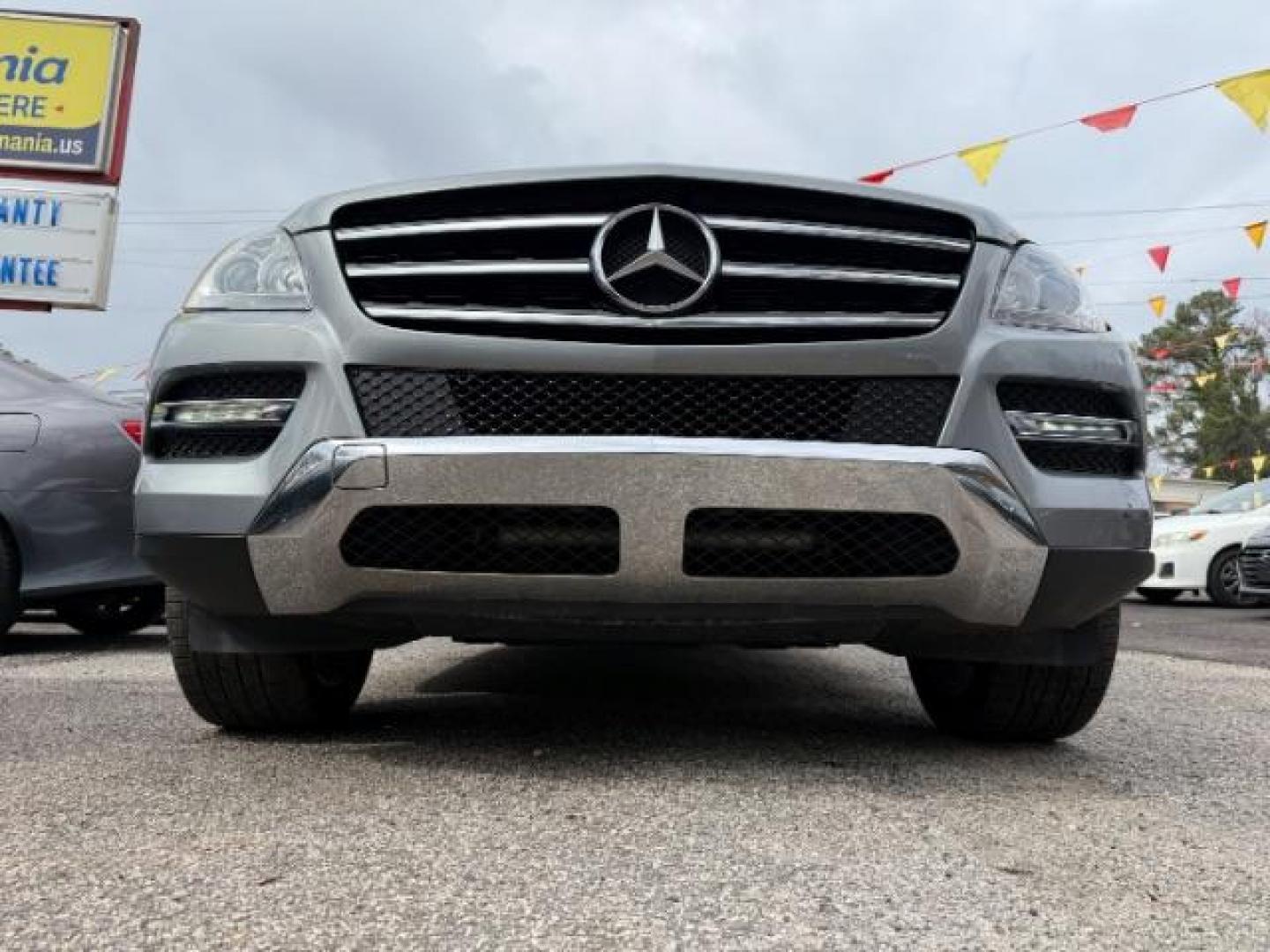 2015 Silver Mercedes-Benz M-Class ML350 (4JGDA5JB6FA) with an 3.5L V6 DOHC 24V engine, 7-Speed Automatic transmission, located at 1806 Veterans Memorial Hwy SW, Austell, GA, 30168, (770) 944-9558, 33.817959, -84.606987 - Photo#13