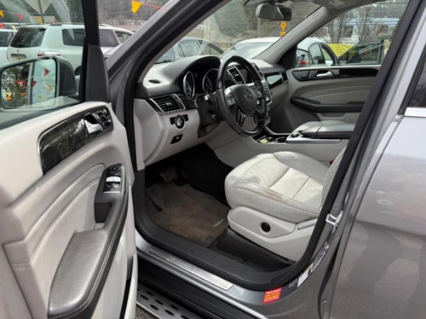 2015 Silver Mercedes-Benz M-Class ML350 (4JGDA5JB6FA) with an 3.5L V6 DOHC 24V engine, 7-Speed Automatic transmission, located at 1806 Veterans Memorial Hwy SW, Austell, GA, 30168, (770) 944-9558, 33.817959, -84.606987 - Photo#14