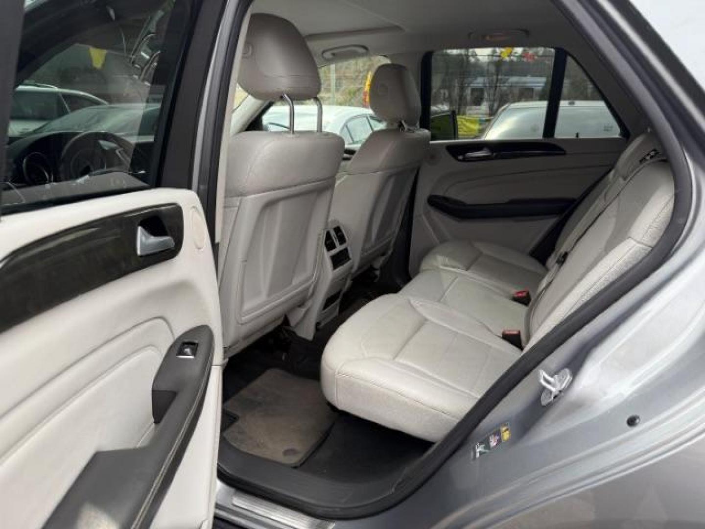2015 Silver Mercedes-Benz M-Class ML350 (4JGDA5JB6FA) with an 3.5L V6 DOHC 24V engine, 7-Speed Automatic transmission, located at 1806 Veterans Memorial Hwy SW, Austell, GA, 30168, (770) 944-9558, 33.817959, -84.606987 - Photo#16
