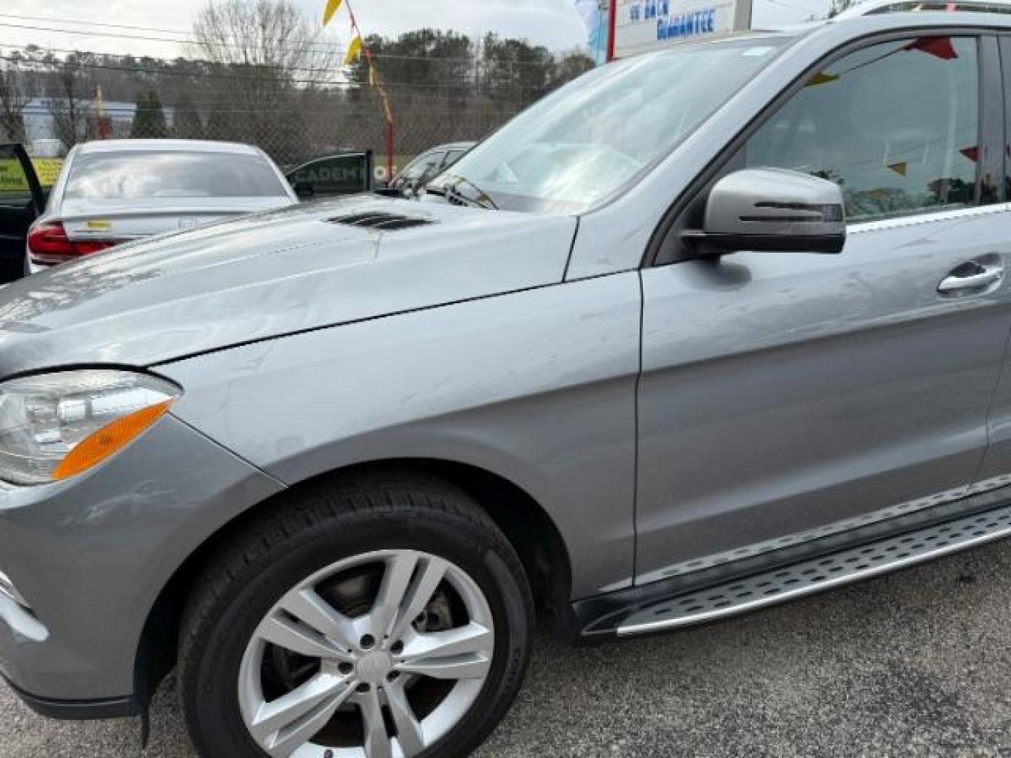2015 Silver Mercedes-Benz M-Class ML350 (4JGDA5JB6FA) with an 3.5L V6 DOHC 24V engine, 7-Speed Automatic transmission, located at 1806 Veterans Memorial Hwy SW, Austell, GA, 30168, (770) 944-9558, 33.817959, -84.606987 - Photo#1