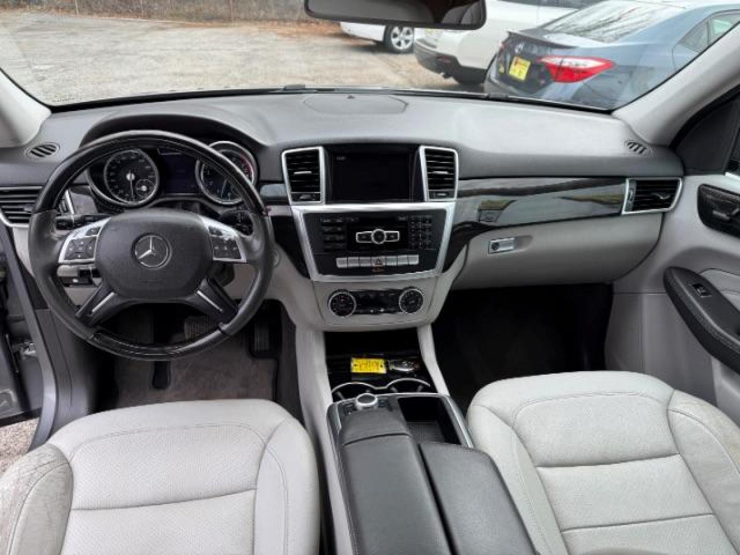 2015 Silver Mercedes-Benz M-Class ML350 (4JGDA5JB6FA) with an 3.5L V6 DOHC 24V engine, 7-Speed Automatic transmission, located at 1806 Veterans Memorial Hwy SW, Austell, GA, 30168, (770) 944-9558, 33.817959, -84.606987 - Photo#18