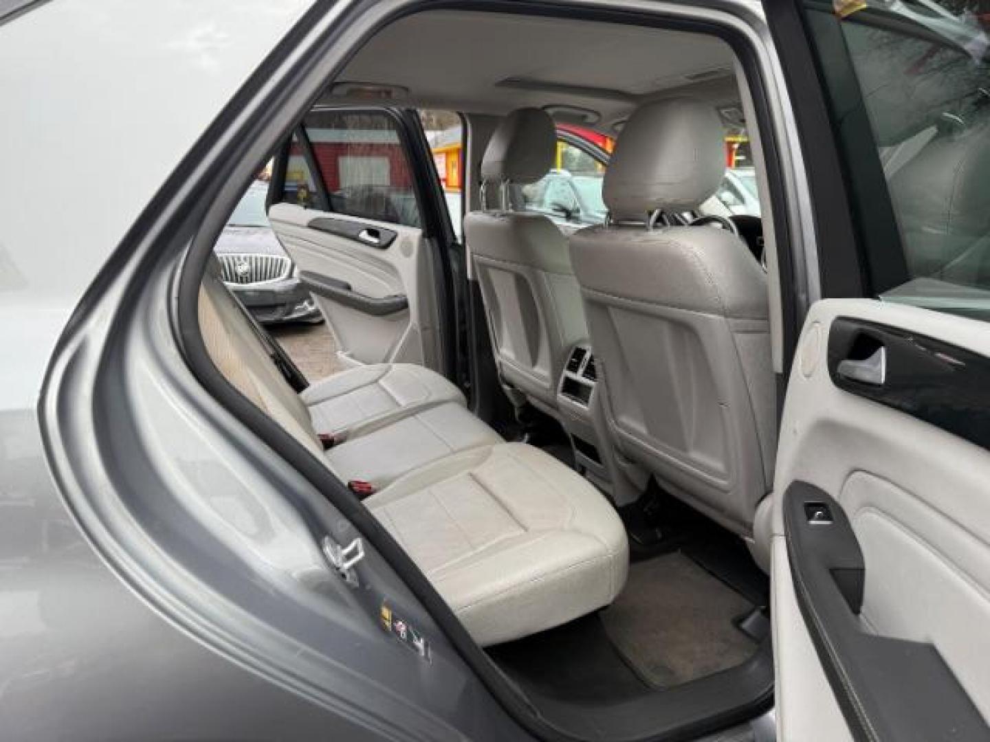 2015 Silver Mercedes-Benz M-Class ML350 (4JGDA5JB6FA) with an 3.5L V6 DOHC 24V engine, 7-Speed Automatic transmission, located at 1806 Veterans Memorial Hwy SW, Austell, GA, 30168, (770) 944-9558, 33.817959, -84.606987 - Photo#20