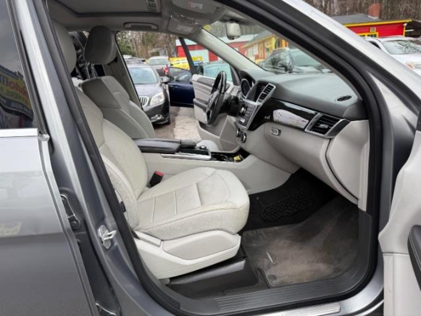 2015 Silver Mercedes-Benz M-Class ML350 (4JGDA5JB6FA) with an 3.5L V6 DOHC 24V engine, 7-Speed Automatic transmission, located at 1806 Veterans Memorial Hwy SW, Austell, GA, 30168, (770) 944-9558, 33.817959, -84.606987 - Photo#21