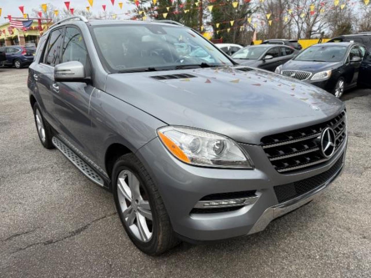 2015 Silver Mercedes-Benz M-Class ML350 (4JGDA5JB6FA) with an 3.5L V6 DOHC 24V engine, 7-Speed Automatic transmission, located at 1806 Veterans Memorial Hwy SW, Austell, GA, 30168, (770) 944-9558, 33.817959, -84.606987 - Photo#3