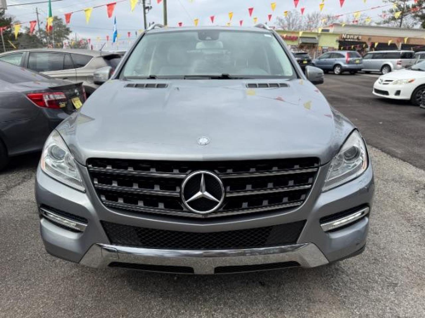 2015 Silver Mercedes-Benz M-Class ML350 (4JGDA5JB6FA) with an 3.5L V6 DOHC 24V engine, 7-Speed Automatic transmission, located at 1806 Veterans Memorial Hwy SW, Austell, GA, 30168, (770) 944-9558, 33.817959, -84.606987 - Photo#4