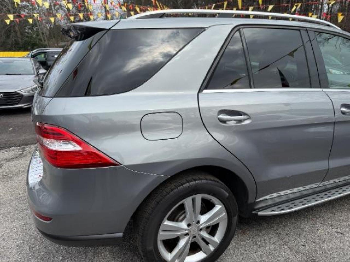 2015 Silver Mercedes-Benz M-Class ML350 (4JGDA5JB6FA) with an 3.5L V6 DOHC 24V engine, 7-Speed Automatic transmission, located at 1806 Veterans Memorial Hwy SW, Austell, GA, 30168, (770) 944-9558, 33.817959, -84.606987 - Photo#6