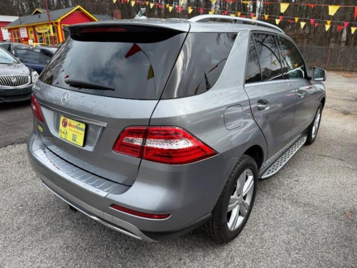 2015 Silver Mercedes-Benz M-Class ML350 (4JGDA5JB6FA) with an 3.5L V6 DOHC 24V engine, 7-Speed Automatic transmission, located at 1806 Veterans Memorial Hwy SW, Austell, GA, 30168, (770) 944-9558, 33.817959, -84.606987 - Photo#7