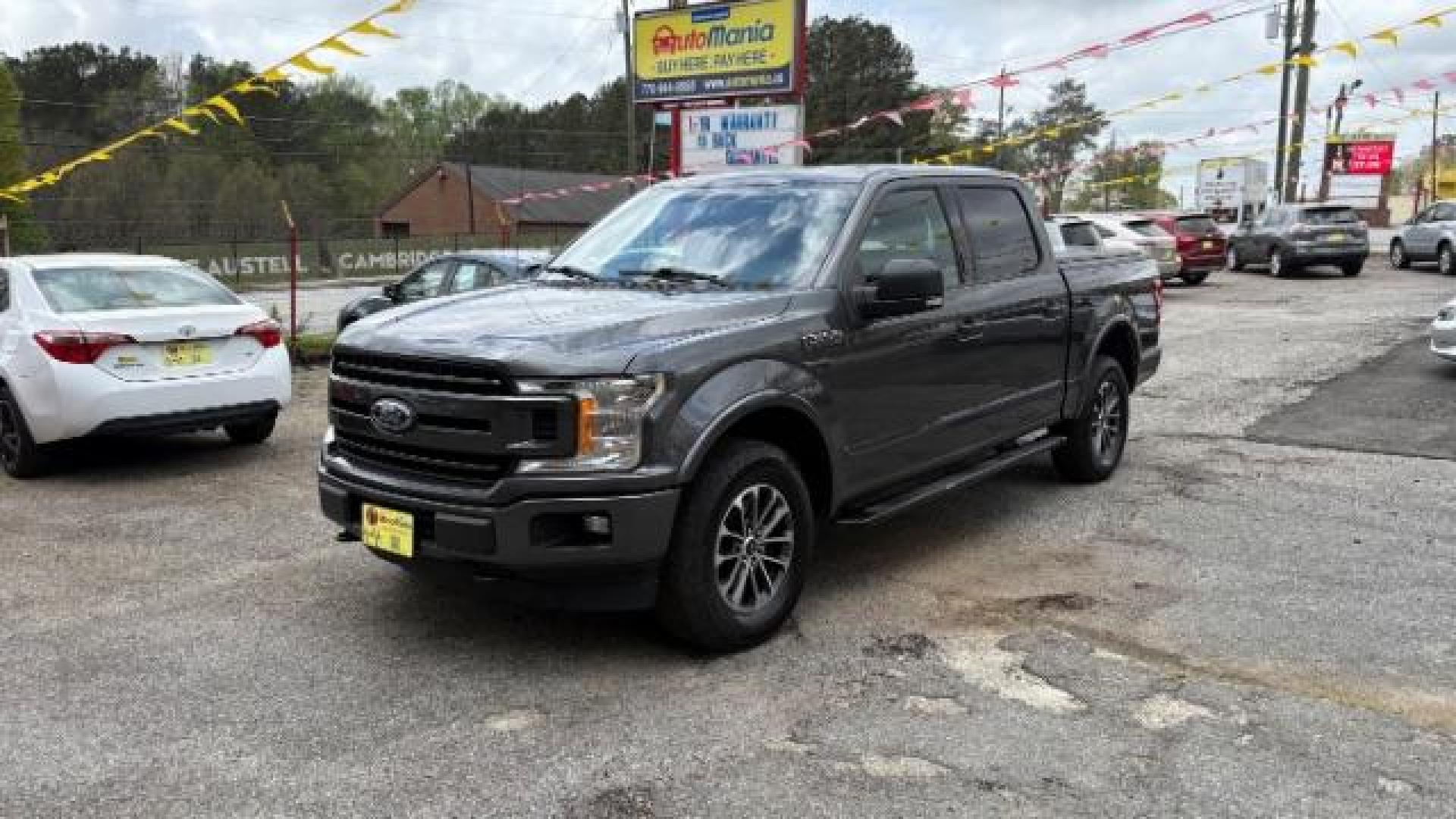 2018 Gray Ford F-150 XLT SuperCrew 6.5-ft. Bed 4WD (1FTEW1EG0JF) with an 3.5L V6 TURBO engine, 6-Speed Automatic transmission, located at 1806 Veterans Memorial Hwy SW, Austell, GA, 30168, (770) 944-9558, 33.817959, -84.606987 - Photo#0