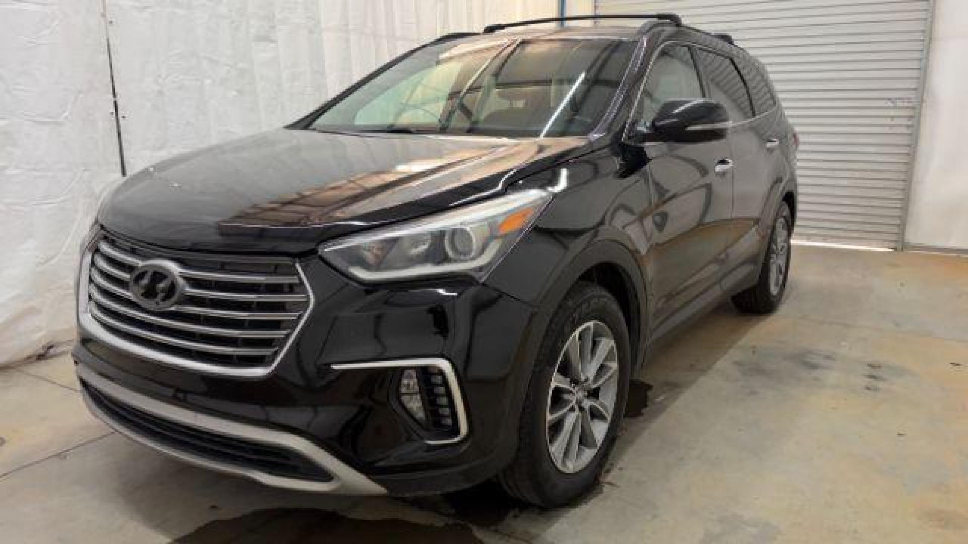 2018 Black Hyundai Santa Fe SE Ultimate (KM8SN4HF4JU) with an 3.3L V6 DOHC 24V engine, 6-Speed Automatic transmission, located at 1806 Veterans Memorial Hwy SW, Austell, GA, 30168, (770) 944-9558, 33.817959, -84.606987 - Photo#0