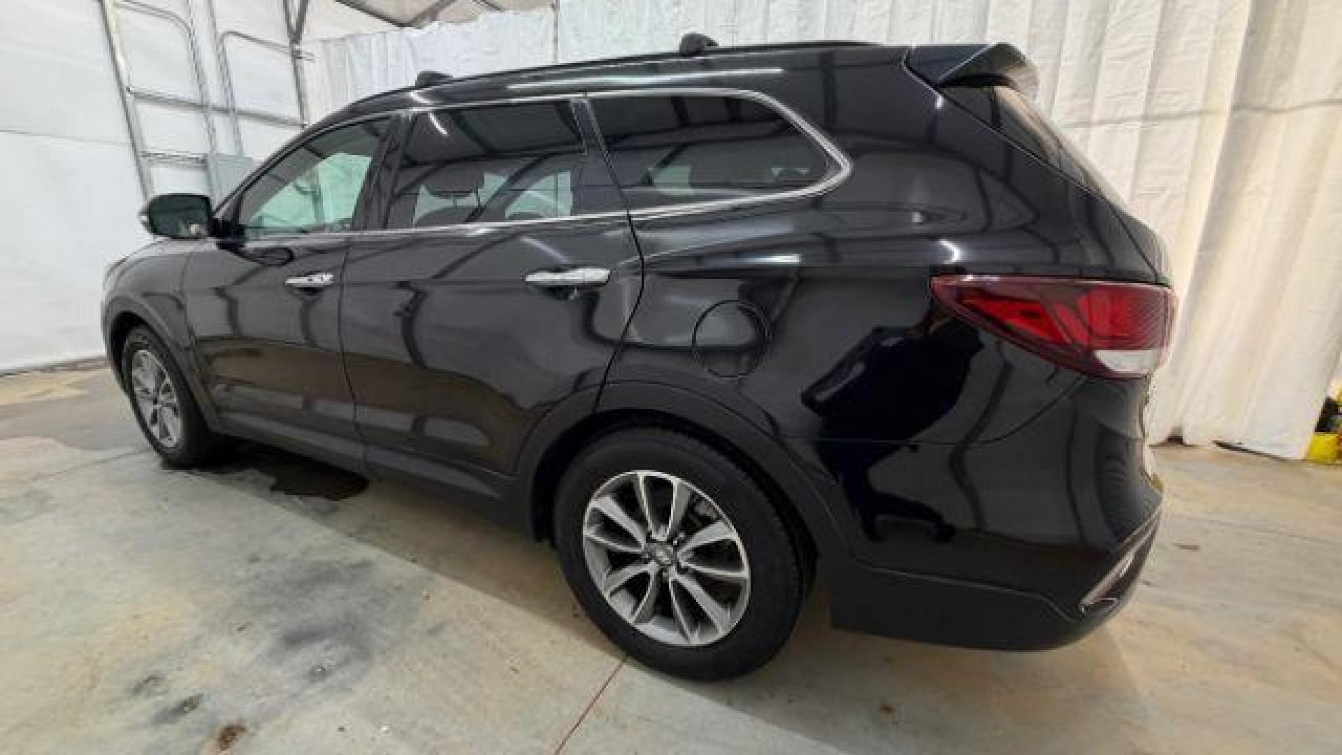 2018 Black Hyundai Santa Fe SE Ultimate (KM8SN4HF4JU) with an 3.3L V6 DOHC 24V engine, 6-Speed Automatic transmission, located at 1806 Veterans Memorial Hwy SW, Austell, GA, 30168, (770) 944-9558, 33.817959, -84.606987 - Photo#2