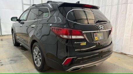 2018 Black Hyundai Santa Fe SE Ultimate (KM8SN4HF4JU) with an 3.3L V6 DOHC 24V engine, 6-Speed Automatic transmission, located at 1806 Veterans Memorial Hwy SW, Austell, GA, 30168, (770) 944-9558, 33.817959, -84.606987 - Photo#3