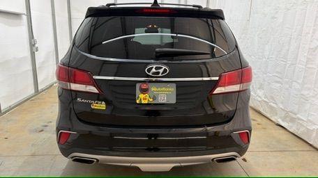 2018 Black Hyundai Santa Fe SE Ultimate (KM8SN4HF4JU) with an 3.3L V6 DOHC 24V engine, 6-Speed Automatic transmission, located at 1806 Veterans Memorial Hwy SW, Austell, GA, 30168, (770) 944-9558, 33.817959, -84.606987 - Photo#4
