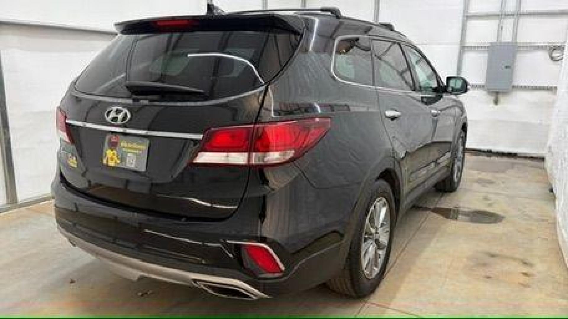 2018 Black Hyundai Santa Fe SE Ultimate (KM8SN4HF4JU) with an 3.3L V6 DOHC 24V engine, 6-Speed Automatic transmission, located at 1806 Veterans Memorial Hwy SW, Austell, GA, 30168, (770) 944-9558, 33.817959, -84.606987 - Photo#5