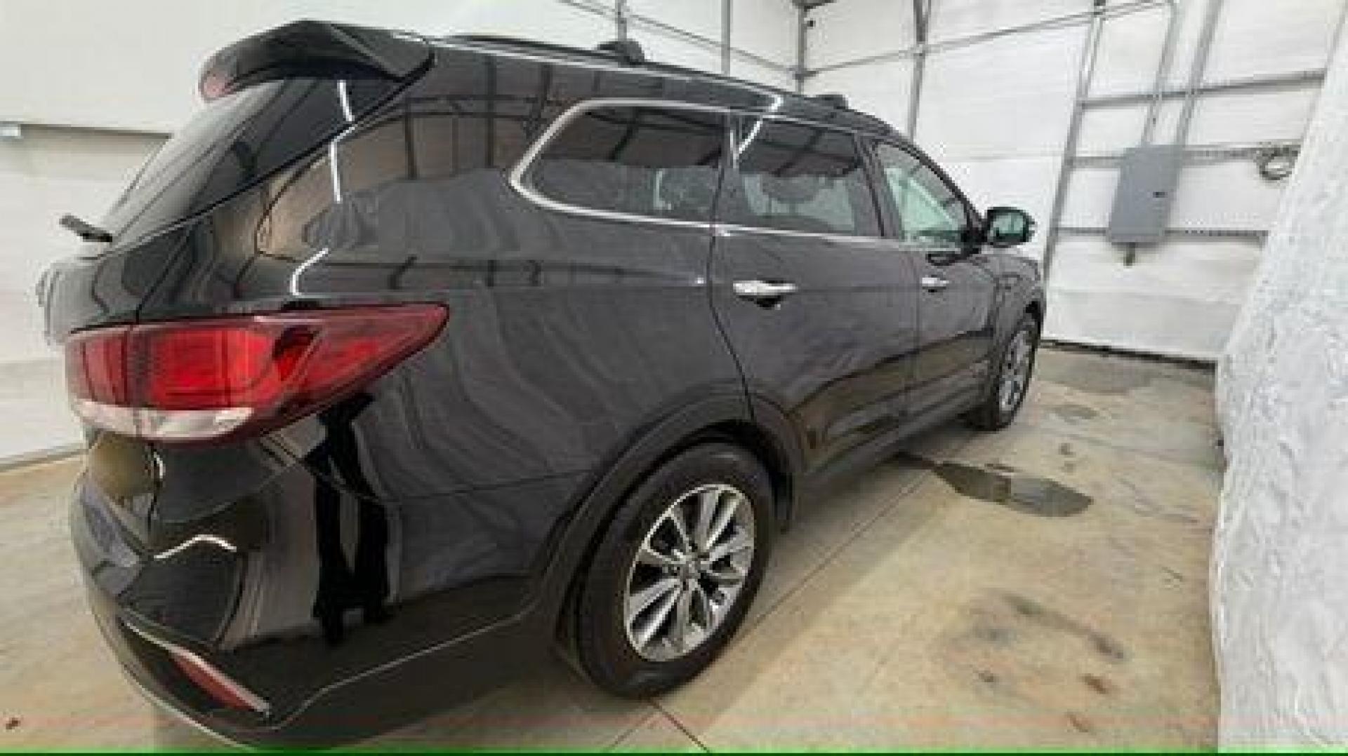 2018 Black Hyundai Santa Fe SE Ultimate (KM8SN4HF4JU) with an 3.3L V6 DOHC 24V engine, 6-Speed Automatic transmission, located at 1806 Veterans Memorial Hwy SW, Austell, GA, 30168, (770) 944-9558, 33.817959, -84.606987 - Photo#6