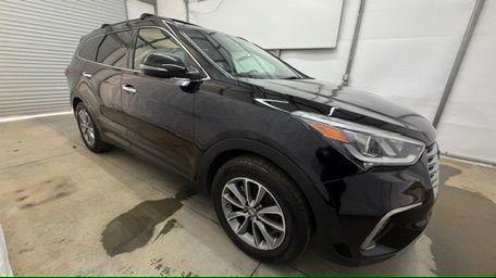 2018 Black Hyundai Santa Fe SE Ultimate (KM8SN4HF4JU) with an 3.3L V6 DOHC 24V engine, 6-Speed Automatic transmission, located at 1806 Veterans Memorial Hwy SW, Austell, GA, 30168, (770) 944-9558, 33.817959, -84.606987 - Photo#7