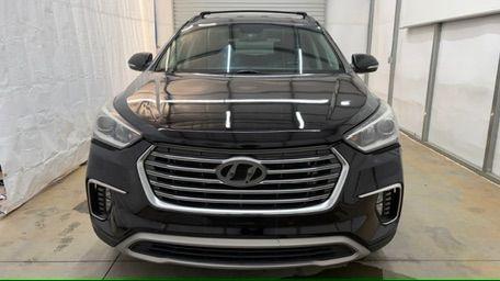 2018 Black Hyundai Santa Fe SE Ultimate (KM8SN4HF4JU) with an 3.3L V6 DOHC 24V engine, 6-Speed Automatic transmission, located at 1806 Veterans Memorial Hwy SW, Austell, GA, 30168, (770) 944-9558, 33.817959, -84.606987 - Photo#9