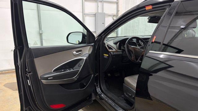 2018 Black Hyundai Santa Fe SE Ultimate (KM8SN4HF4JU) with an 3.3L V6 DOHC 24V engine, 6-Speed Automatic transmission, located at 1806 Veterans Memorial Hwy SW, Austell, GA, 30168, (770) 944-9558, 33.817959, -84.606987 - Photo#10