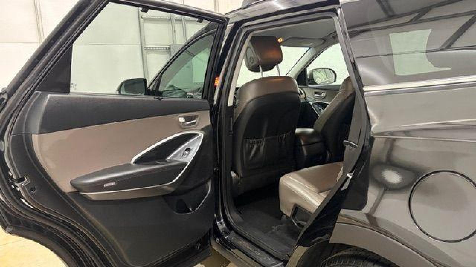 2018 Black Hyundai Santa Fe SE Ultimate (KM8SN4HF4JU) with an 3.3L V6 DOHC 24V engine, 6-Speed Automatic transmission, located at 1806 Veterans Memorial Hwy SW, Austell, GA, 30168, (770) 944-9558, 33.817959, -84.606987 - Photo#13