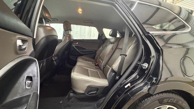 2018 Black Hyundai Santa Fe SE Ultimate (KM8SN4HF4JU) with an 3.3L V6 DOHC 24V engine, 6-Speed Automatic transmission, located at 1806 Veterans Memorial Hwy SW, Austell, GA, 30168, (770) 944-9558, 33.817959, -84.606987 - Photo#14