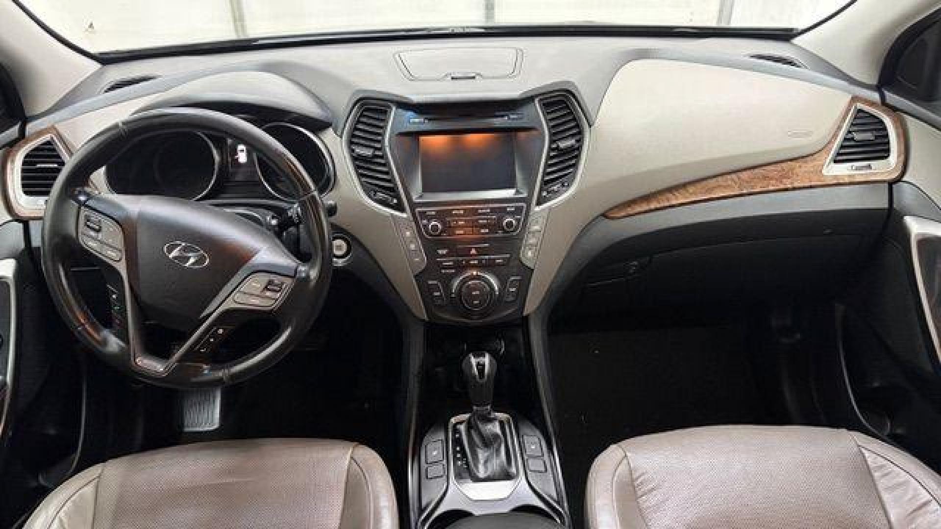 2018 Black Hyundai Santa Fe SE Ultimate (KM8SN4HF4JU) with an 3.3L V6 DOHC 24V engine, 6-Speed Automatic transmission, located at 1806 Veterans Memorial Hwy SW, Austell, GA, 30168, (770) 944-9558, 33.817959, -84.606987 - Photo#16