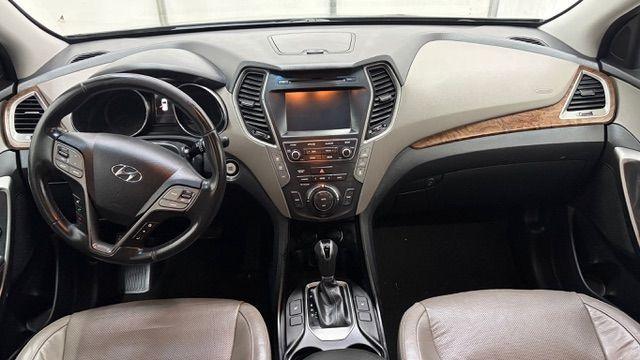 2018 Black Hyundai Santa Fe SE Ultimate (KM8SN4HF4JU) with an 3.3L V6 DOHC 24V engine, 6-Speed Automatic transmission, located at 1806 Veterans Memorial Hwy SW, Austell, GA, 30168, (770) 944-9558, 33.817959, -84.606987 - Photo#16