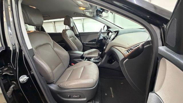 2018 Black Hyundai Santa Fe SE Ultimate (KM8SN4HF4JU) with an 3.3L V6 DOHC 24V engine, 6-Speed Automatic transmission, located at 1806 Veterans Memorial Hwy SW, Austell, GA, 30168, (770) 944-9558, 33.817959, -84.606987 - Photo#19