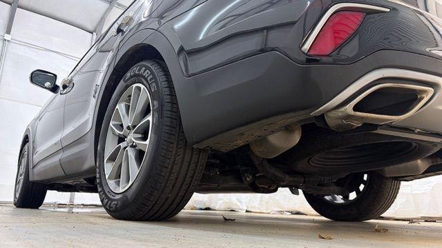 2018 Black Hyundai Santa Fe SE Ultimate (KM8SN4HF4JU) with an 3.3L V6 DOHC 24V engine, 6-Speed Automatic transmission, located at 1806 Veterans Memorial Hwy SW, Austell, GA, 30168, (770) 944-9558, 33.817959, -84.606987 - Photo#22