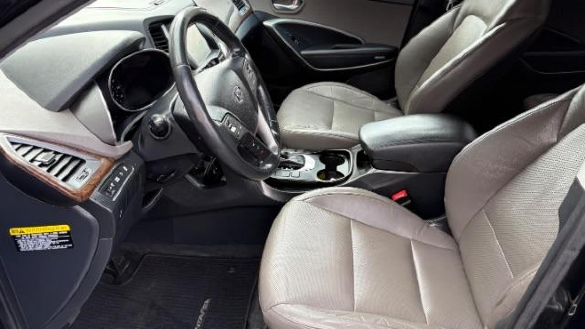 2018 Black Hyundai Santa Fe SE Ultimate (KM8SN4HF4JU) with an 3.3L V6 DOHC 24V engine, 6-Speed Automatic transmission, located at 1806 Veterans Memorial Hwy SW, Austell, GA, 30168, (770) 944-9558, 33.817959, -84.606987 - Photo#16