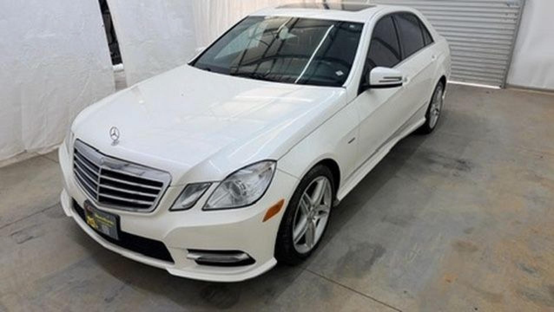 2012 White Mercedes-Benz E-Class E350 Sedan (WDDHF5KB0CA) with an 3.5L V6 DOHC 24V engine, 7-Speed Automatic transmission, located at 1806 Veterans Memorial Hwy SW, Austell, GA, 30168, (770) 944-9558, 33.817959, -84.606987 - This Benz E-Class has brand-new tires and a paint job in good condition. There is a small crack in the rear bumper. Inside, the interior is in good condition and smells great; it comes from a non-smoking vehicle. The seam on the driver's seat has a patch.- Photo#0
